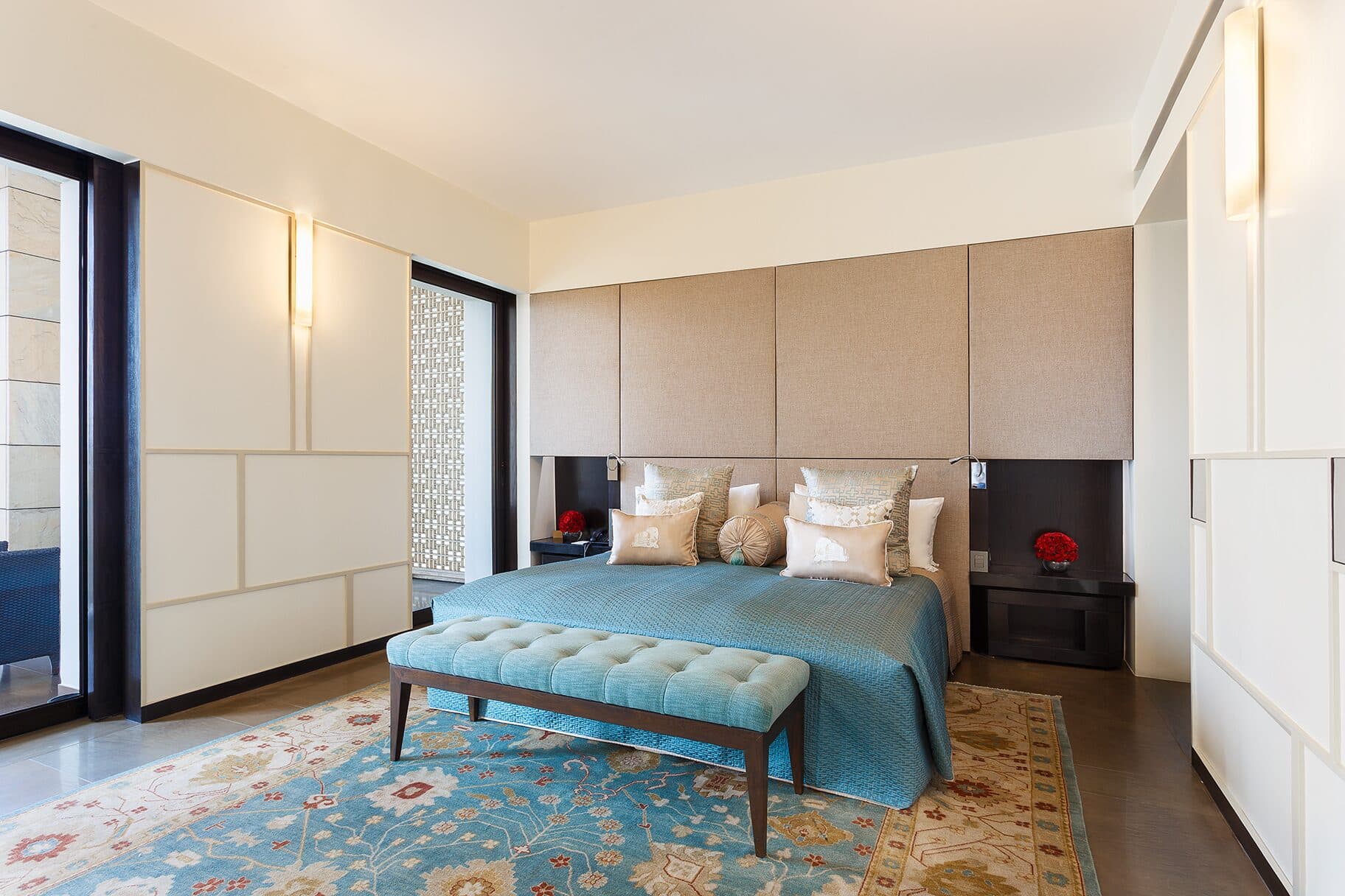 A spacious room at The Lodhi New Delhi with timber screens and garden light